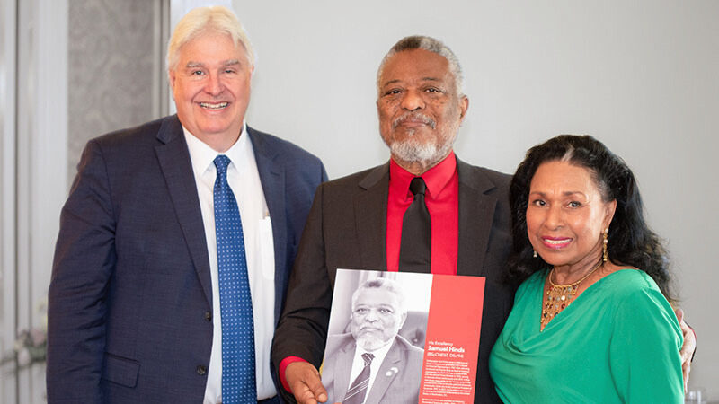 UNB President Paul Mazerolle, Ambassador Sam Hinds, Yvonne Hinds