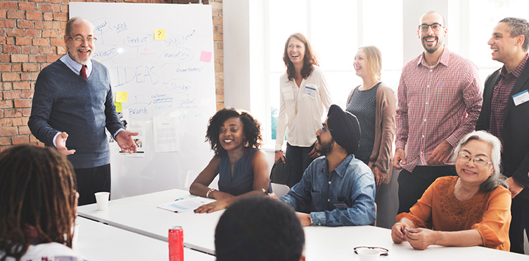 Photo of a professional leading a team meeting