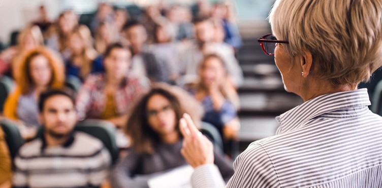 Individual doing a presentation in front of a group