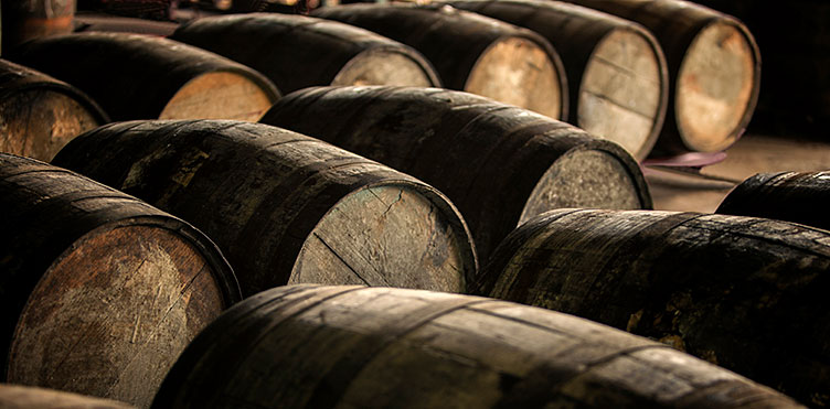 Rows of rum barrels.