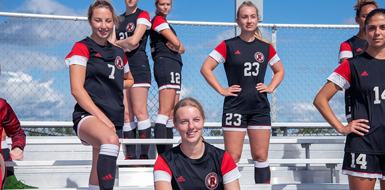 UNB women's soccer team stands with determination